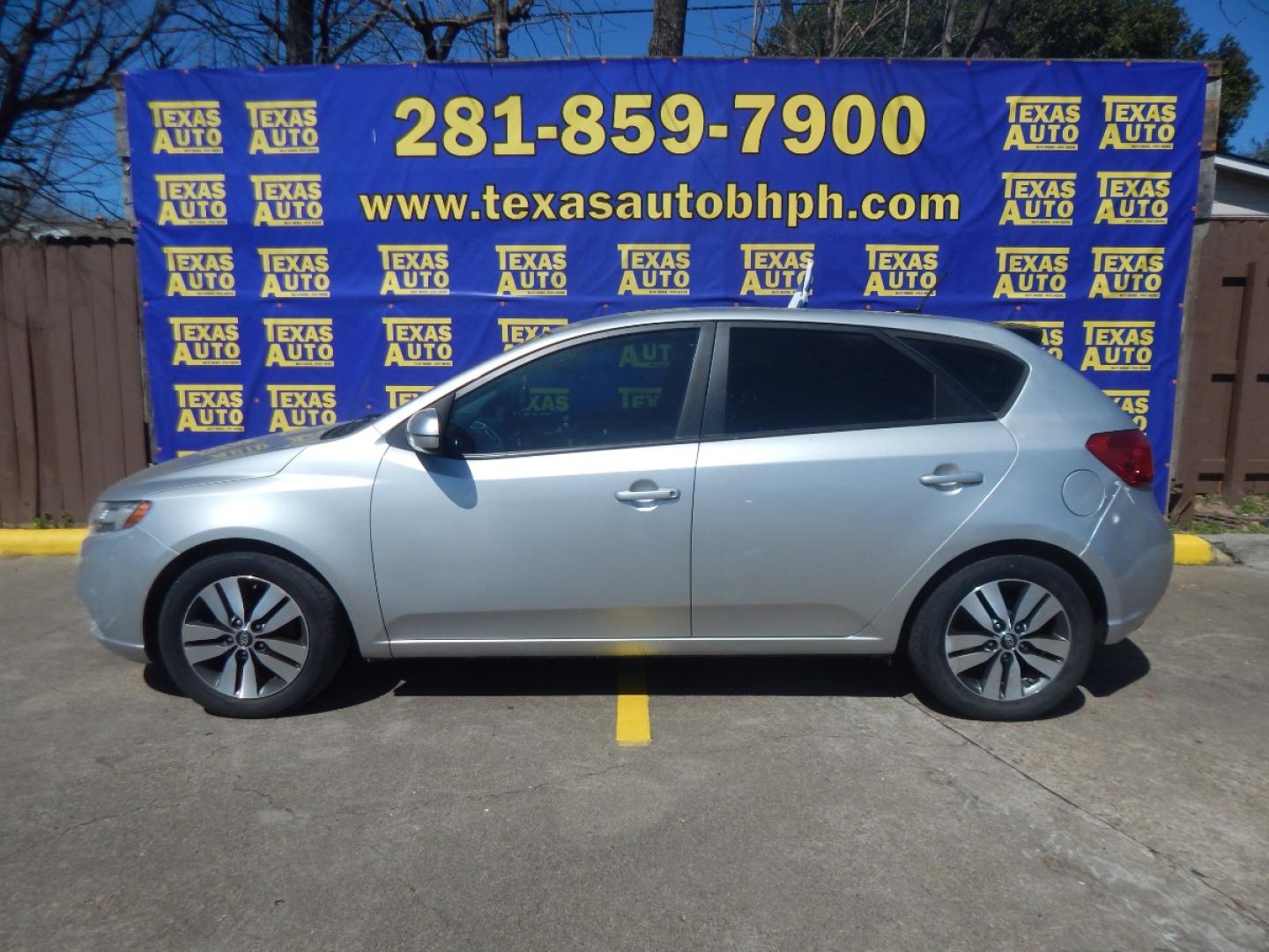 2013 SILVER KIA FORTE 5-DOOR EX (KNAFU5A25D5) with an 2.0L L4 DOHC 16V engine, AUTOMATIC transmission, located at 16710 Clay Rd., Houston, TX, 77084, (281) 859-7900, 0.000000, 0.000000 - Low Down. Low Payments. - Photo#0