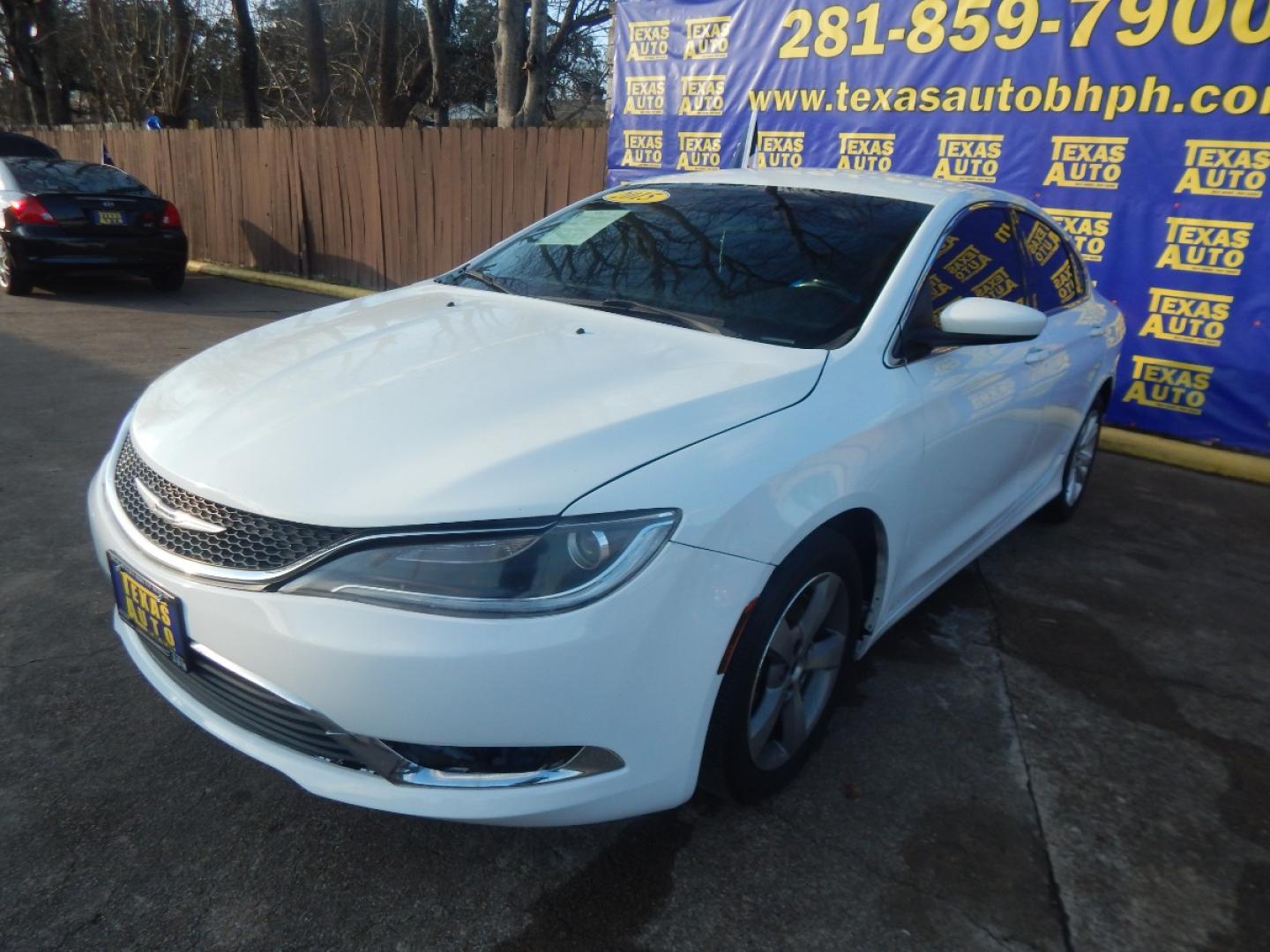 2015 WHITE CHRYSLER 200 Limited (1C3CCCAB6FN) with an 2.4L L4 DOHC 16V engine, 9-SPEED AUTOMATIC transmission, located at 16710 Clay Rd., Houston, TX, 77084, (281) 859-7900, 0.000000, 0.000000 - Low Donw. Low Payments. - Photo#2